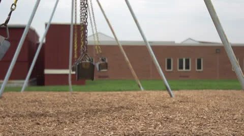 Slow Motion Empty Swing Set HD Video Stock Footage 24632145