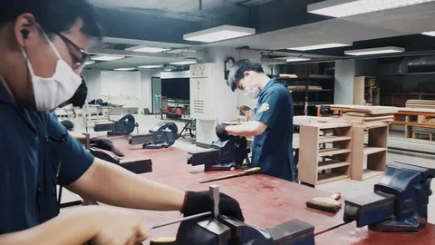 Slow motion of Engineering students perform metal file in workshop class Stock-Footage 102572756