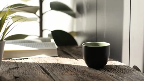 Slow motion espresso and hot coffee in cozy mug tranquil indoor setting Stock Footage 296997912
