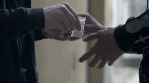 Slow motion of exchanging illegal narcotics and money Stock Footage 67258741