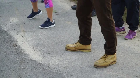 Slow motion - exercises show close up legs Stock Footage 124823576