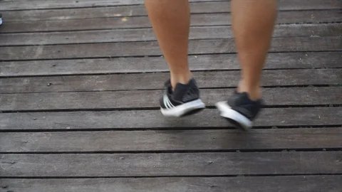 Slow motion - exercises show close up legs Stock Footage 124823580