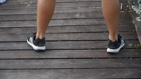 Slow motion exercises show close up legs Stock Footage 124823582