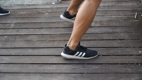 Slow motion - exercises show close up legs Stock Footage 124823645