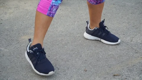 Slow motion - exercises show close up legs Stock Footage 124823982