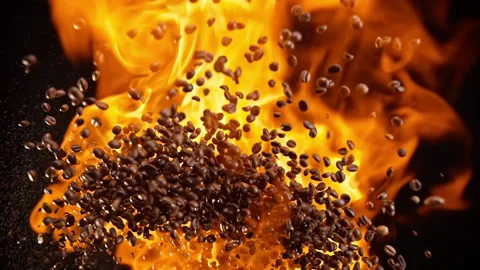 Slow motion of explosion of coffee flying in flames Stock Footage 148179575