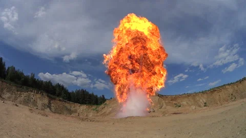 Slow motion explosion of a fiery cloud. Bright flash with a fireball. Stock Footage 90740585