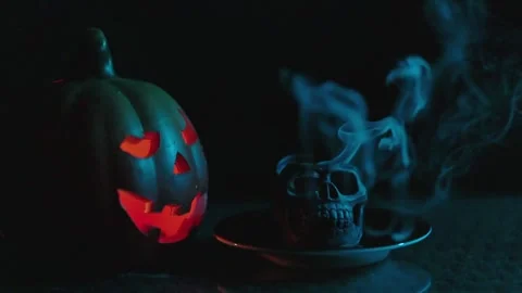 Slow motion  of an extinguished smoking skull candle at night Video stock 289877552