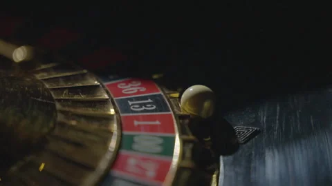 Slow motion extreme close-up ball stopping on 13, numbers right Видео 335699878