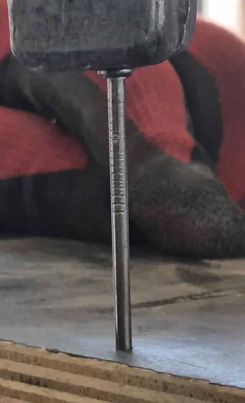 Slow Motion Extreme Close-up of Hammer Hitting a Nail Stock Footage 332506451