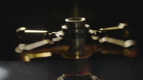 Slow motion extreme close-up hand spinning roulette Stockbeeldmateriaal 335700011
