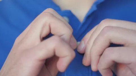 Slow motion of a extreme close up of a man hands wearing a blue shirt 스톡 동영상 49885932