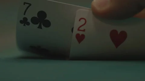 Slow motion extreme close-up player looking at cards Vidéo 334037287