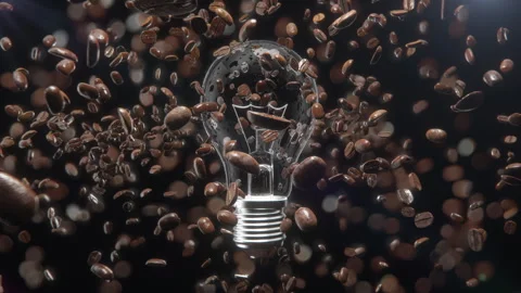 Slow motion extreme closeup Exploding coffee beans turn into light bulbs Stock Footage 284809733