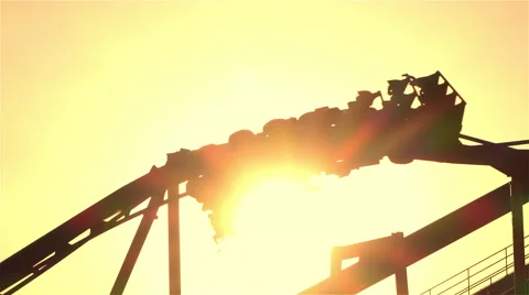 SLOW MOTION: Extreme roller coaster ride upside down looping Stock Footage 62055673