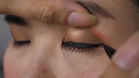 Slow motion, eyeshadow pen makeup beauty of beautiful eye Stock Footage 90541564