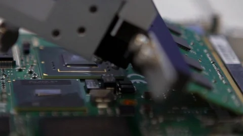 Slow Motion of factory machinery at work. PCB Processing on CNC machine.-Dan Stock Footage 120185286
