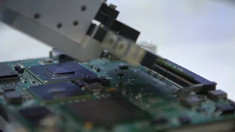 Slow Motion of factory machinery at work. PCB Processing on CNC machine.-Dan Stock Footage 120185449