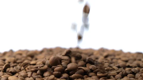 Slow Motion Falling coffee beans video Stock Footage 128750710