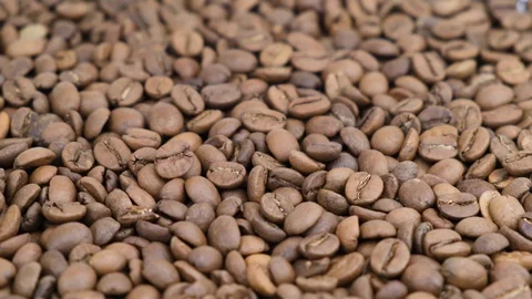 Slow Motion Falling coffee beans video Stock Footage 128751643