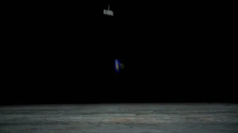 Slow motion of falling colored push pins a black Stock Footage 101488118