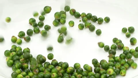 Slow Motion Falling Fresh Green Peppercorns White Background Vídeo Stock 331116748