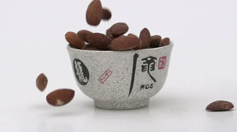 Slow motion falling hazelnuts Stock Footage 33801536