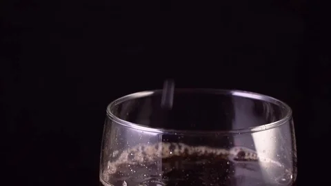 Slow motion falling ice into a cola Stock Footage 122852666
