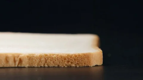 SLOW MOTION: Falling of ingredients on a sandwich Stock Footage 70804617