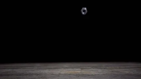 Slow motion of falling nuts on black background. Stock Footage 101496050