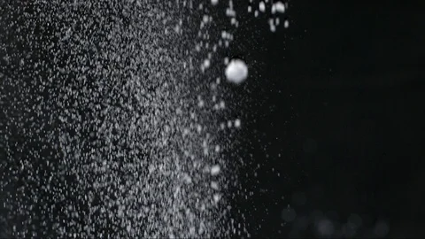 Slow motion falling powder Stock Footage 77612160
