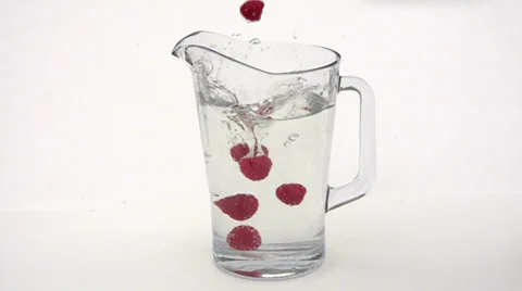 Slow motion falling raspberries Stock Footage 33801953