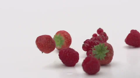 Slow motion falling red fruit Stock Footage 33801945