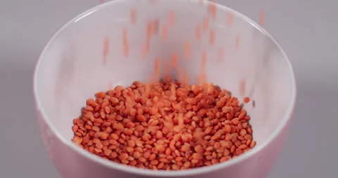 Slow Motion Falling Red Lentils. Macro Shot Lentil Texture Pattern Backgrou.. Stock Footage 318464222