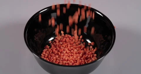 Slow Motion Falling Red Lentils. Macro Shot Lentil Texture Pattern Backgrou.. Stock Footage 318472410
