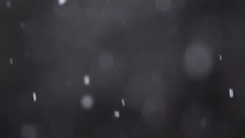 Slow motion of falling snow. Blurred winter background. Snowing dream. Stock Footage 148150702