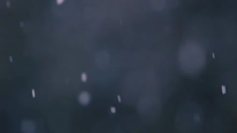 Slow motion of falling snow. Blurred winter background. Stock Footage 148150725