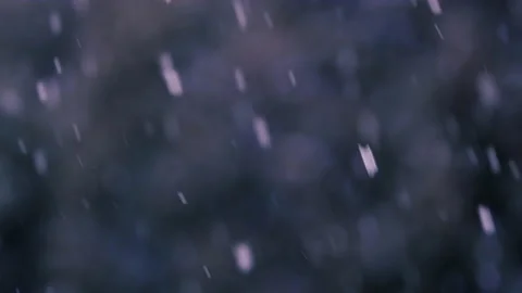 Slow motion of falling snow. Blurred winter background. Video stock 148155594