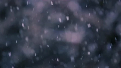 Slow motion of falling snow. Blurred winter background. Video stock 148160424