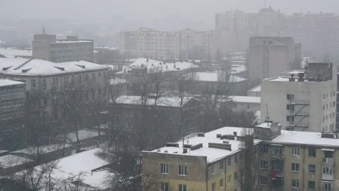 Slow motion of falling snow at the city. Nice winter background. Winter Stock Footage 87842199