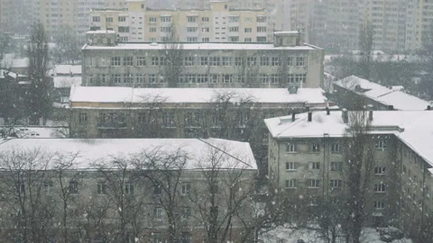Slow motion of falling snow at the city. Nice winter background. Winter Stock Footage 87843068