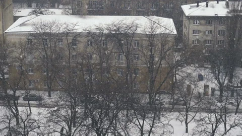 Slow motion of falling snow at the city. Nice winter background. Winter Stock Footage 87843659