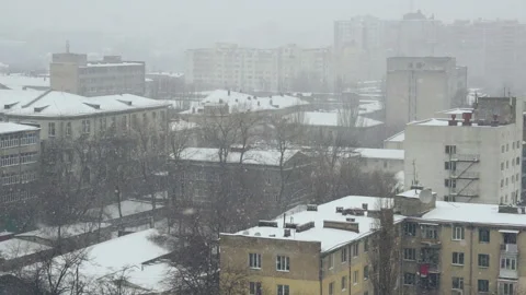 Slow motion of falling snow at the city. Nice winter background. Winter Stock Footage 87968774