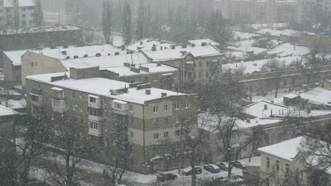 Slow motion of falling snow at the city. Nice winter background. Winter Stock Footage 87969494