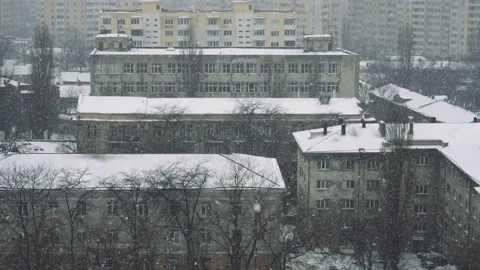 Slow motion of falling snow at the city. Nice winter background. Winter Stock Footage 87970823