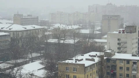 Slow motion of falling snow at the city. Nice winter background. Winter Stock Footage 88039551
