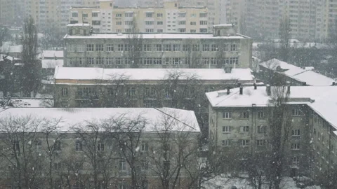 Slow motion of falling snow at the city. Nice winter background. Winter Stock Footage 88052435