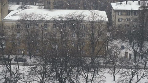 Slow motion of falling snow at the city. Nice winter background. Winter Stock Footage 88169665
