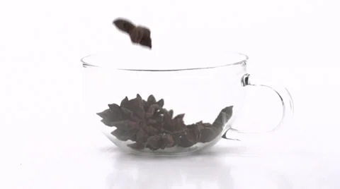 Slow motion falling star anise Stock Footage 33802118