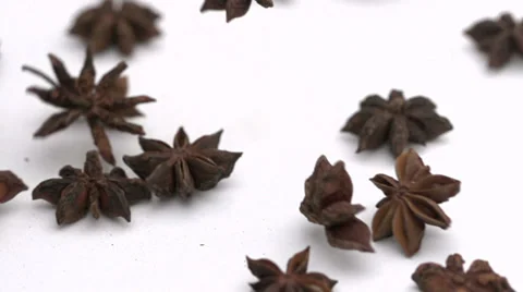 Slow motion falling star anise Stock Footage 33802134